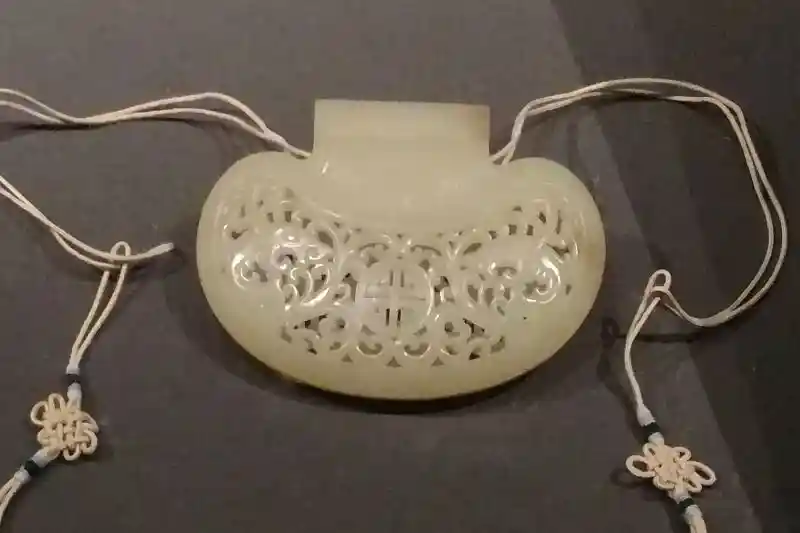 Two dragons and a cross on a fragrance pouch, National Palace Museum